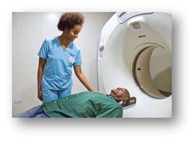 Healthcare Professional with a patient about to enter a CT Scan for lung cancer screening